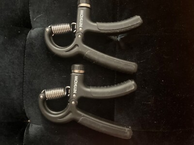 Two Handheld grip strength trainers - black - grey - new and working- adjustable