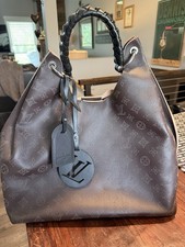 Louis Vuitton Carmel handbag with braided han...