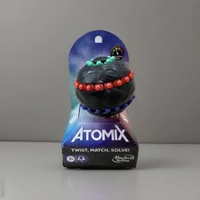 Hasbro~Gaming~Atomix Puzzle Ball~Twist/Match/Solve~Brain Teaser Toy~All Ages