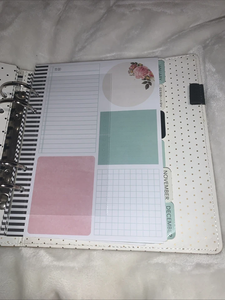 Libro calendario/planificador mensual a rayas dorado y blanco Foto 3 de 4