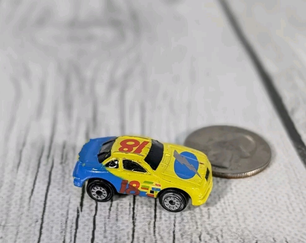Galoob Micro Machine Pontiac Grand prix NASCAR Race Car in Yellow/Blue Number 18