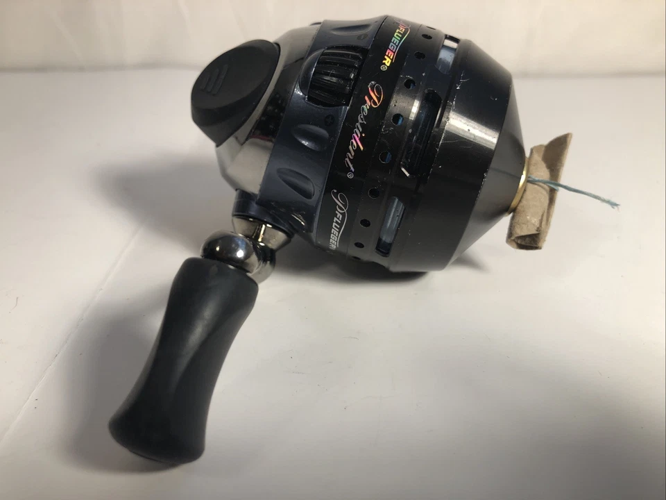 Carrete de pesca Pflueger President Spincast, tamaño 10, para diestros Foto 4 de 4
