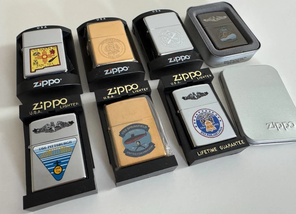 Ooh la la, BRAND NEW! Lot of 7 Vintage US Navy Ship Zippo Lighters - Image 2 of 4