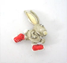J J Jonette Rabbit Pin Running and Wearing Red Sneakers