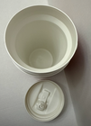 White vintage NWT Igloo 1/2 gallon cooler with black lid and side, made in USA, on a light gray surface.