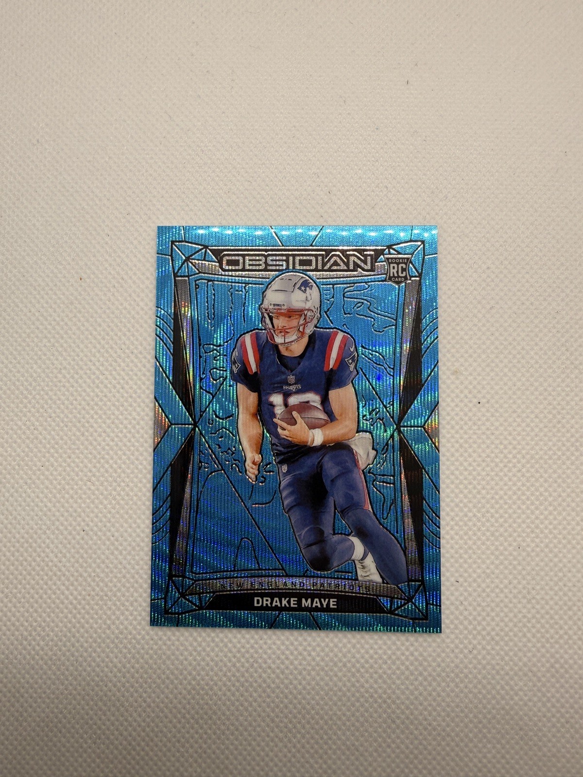 2024 Panini Obsidian International Blue Wave Drake Maye #132 Rookie RC Patriots