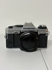 Olympus OMG 35mm SLR Film Camera Body, Chrome For Parts/Repair 