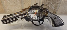 Revolver Shaped Quartz Clock With Alarm. Tested and working.