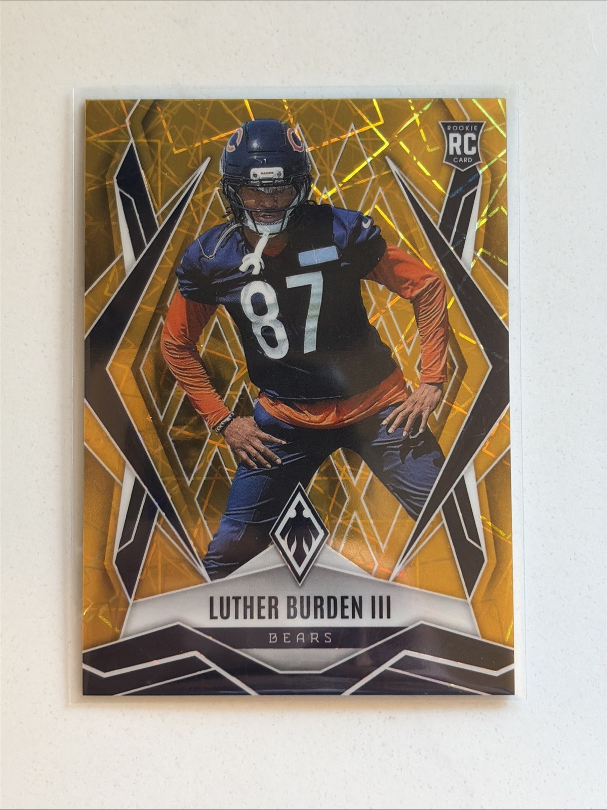 2025 Panini Phoenix - Rookies Luther Burden III #196 Gold Lazar /10 (RC, NUM)