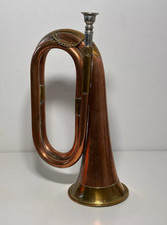 Brass and copper bugle, vintage trumpet, antique musical instrument
