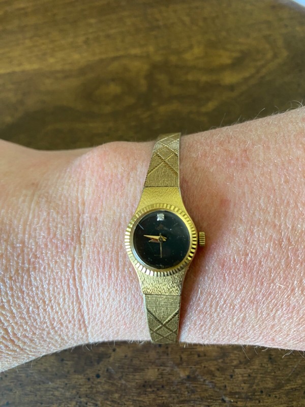Lotus Gold watch with diamond