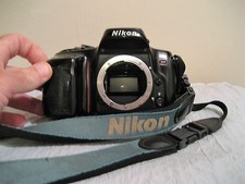 NIKON N50 35MM CAMERA selling as is not tested need batteries comes with booklet