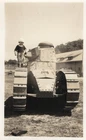 Antique 1920's Photo Snapshot Of Adorable Baby Infant On WW1 Tank w White Helmet