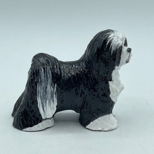 RON HEVENER FIGURINE OF A TIBETAN TERRIER DOG, SIGNED BY ARTIST