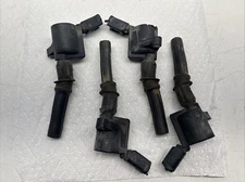 OEM 4PC IGNITION COILS 1997 1998 1999 - 2011 Ford Lincoln Mercury 8W7E-12A366-AA