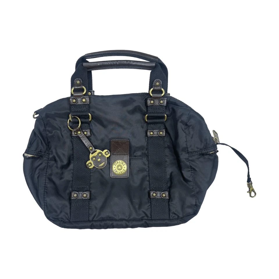 Bolso Cartera Vintage Kipling Joanne Colección Ciudad 8” x 6” x 9.5” Cuero Nailon Foto 3 de 4