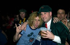 Singer Zach Davidson hops down to hug a fan when he Vendetta Red o- Old Photo 1