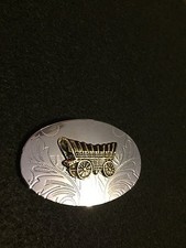 Metal Covered Wagon Belt Buckle Probably from the 60's small raised