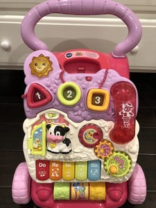 sit to stand learning walker pink