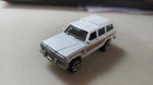 MATCHBOX - JEEP WAGONEER WHITE LOOSE 1/64 APROX *NEW*