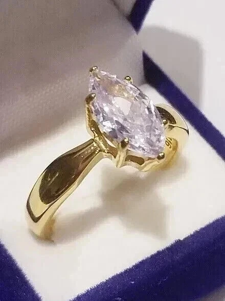 Anillo de compromiso de corte marquesa de diamantes creado en laboratorio de 3 quilates enchapado en oro blanco 925 de 14 quilates Foto 3 de 4