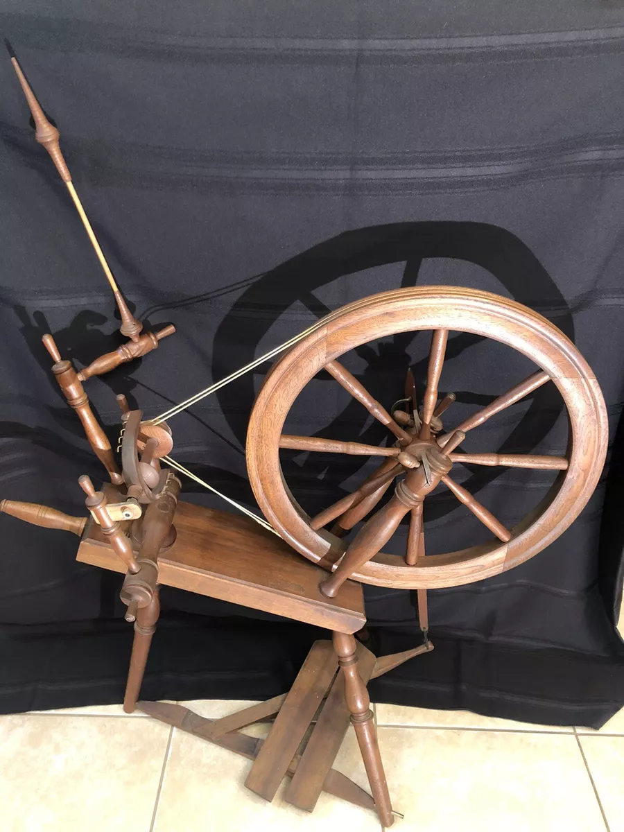 Spinning Wheel For Making Yarn From Wool Fibers. Vintage Rustic Equipment, Stock image