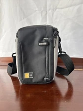 Case Logic compact camera case, such as the TBC-302 or TBC-402 model.