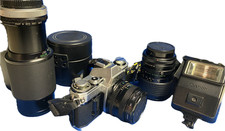 Canon AE-1 35mm SLR Film Camera w/ 50mm/28-85mm/75-205mm lenses  Flash