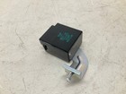 Black rectangular 02-07 Subaru Impreza chassis ECM with printed specifications, mounted on a silver metal plate.