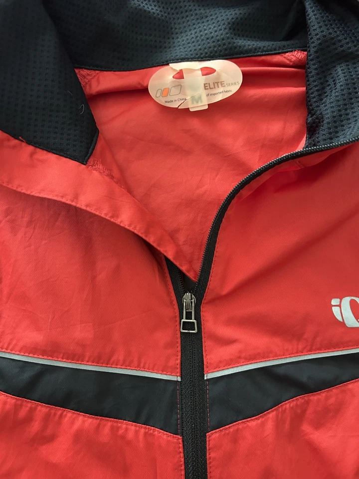 Chaqueta de ciclismo Pearl Izumi Elite Softshell cremallera completa para hombre mediana roja y negra Foto 2 de 4