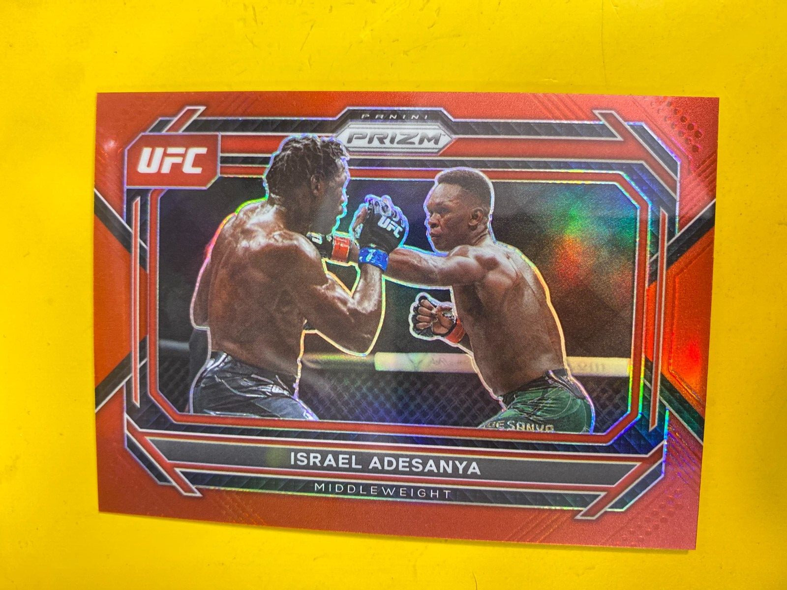 RS9018 2023 Panini Prizm UFC Prizms Red #82 Israel Adesanya #87/199