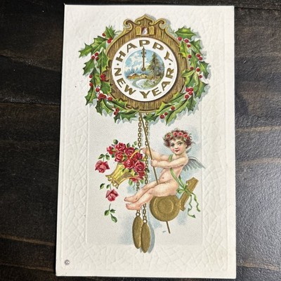 German Embossed New Year Postcard Cherub on Pendulum Roses Series 218 D