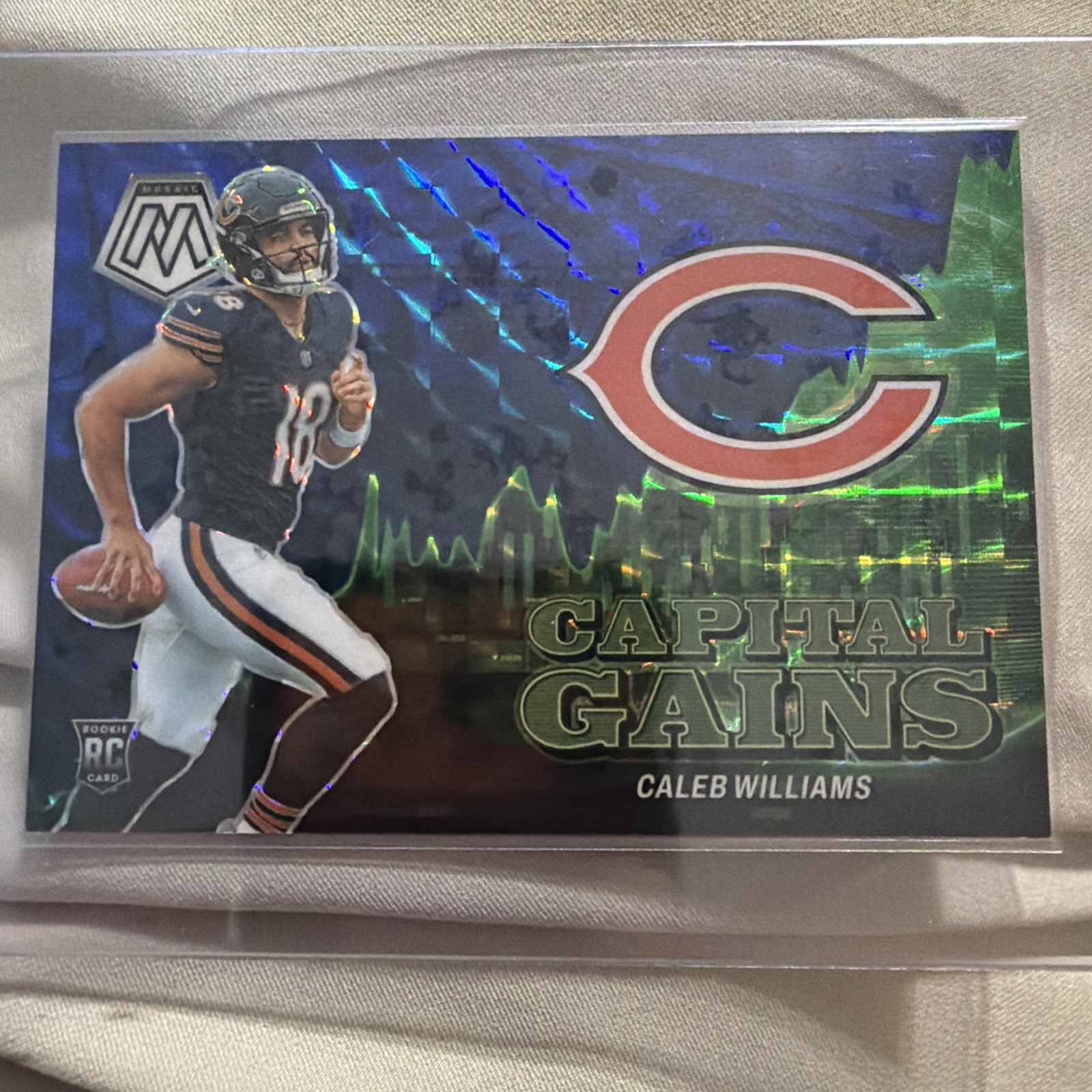 2024 Panini Mosaic Capital Gains Caleb Williams #2 Blue Mosaic Prizm /99 Rookie