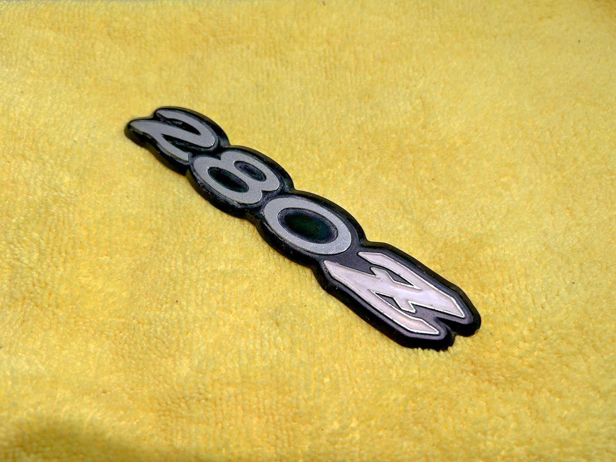 タイタン・フォース（日本盤） Nissan Datsun 280Z Fender Emblem 0024N-41889 Used | eBay