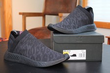 nmd cs2 triple black on feet