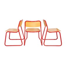 A Set Of 5 Modernist Plywood And Red Enamel Dining Chairs