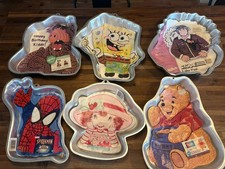 Wilton Cake Pans Sponge Bob Strawberry Shortcake GI Joe Pooh Alf NOS Lot Of Six