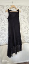 Nicowa Black Sleeveless Maxi Dress with Beaded Embellishments & Asymmetrical Hem