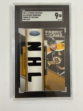 2011-12 PANINI CERTIFIED PATRICE BERGERON FABRIC OF THE GAME NHL 8/25 #11 SGC 9