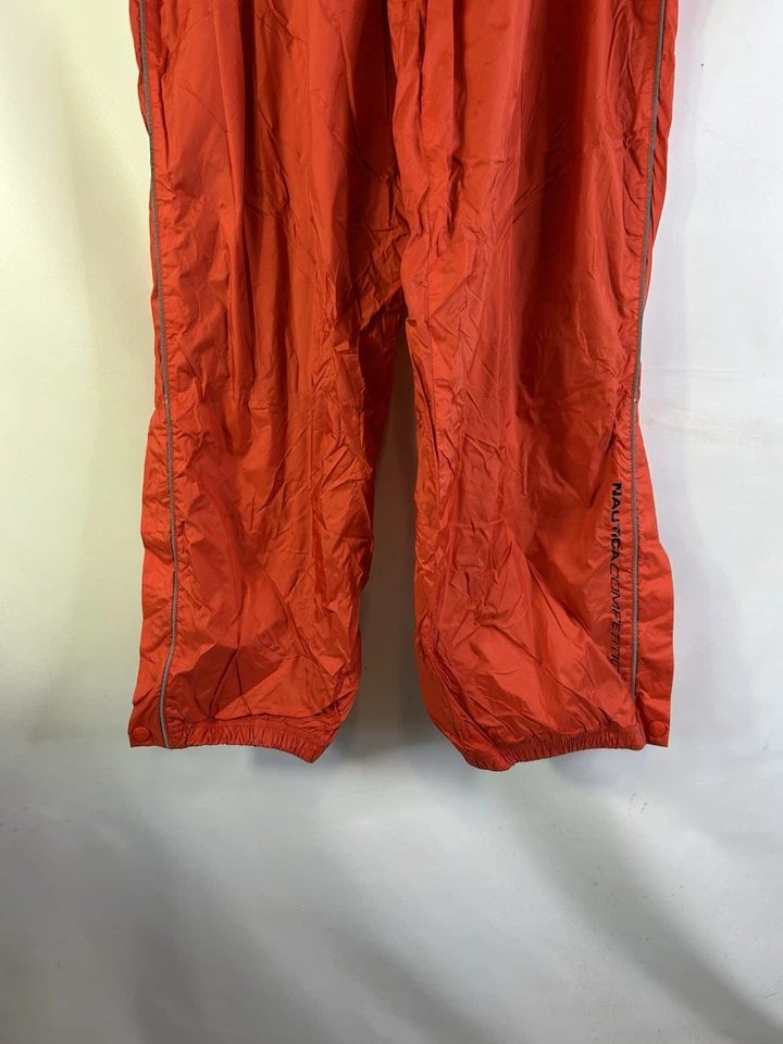 Pantalones deportivos de gimnasio holgados de nailon medianos de colección de los 90 Nautica para hombre naranja Foto 2 de 4