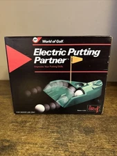 Electric Putting Partner unused World of Golf JR100 tested and works w/box, flag