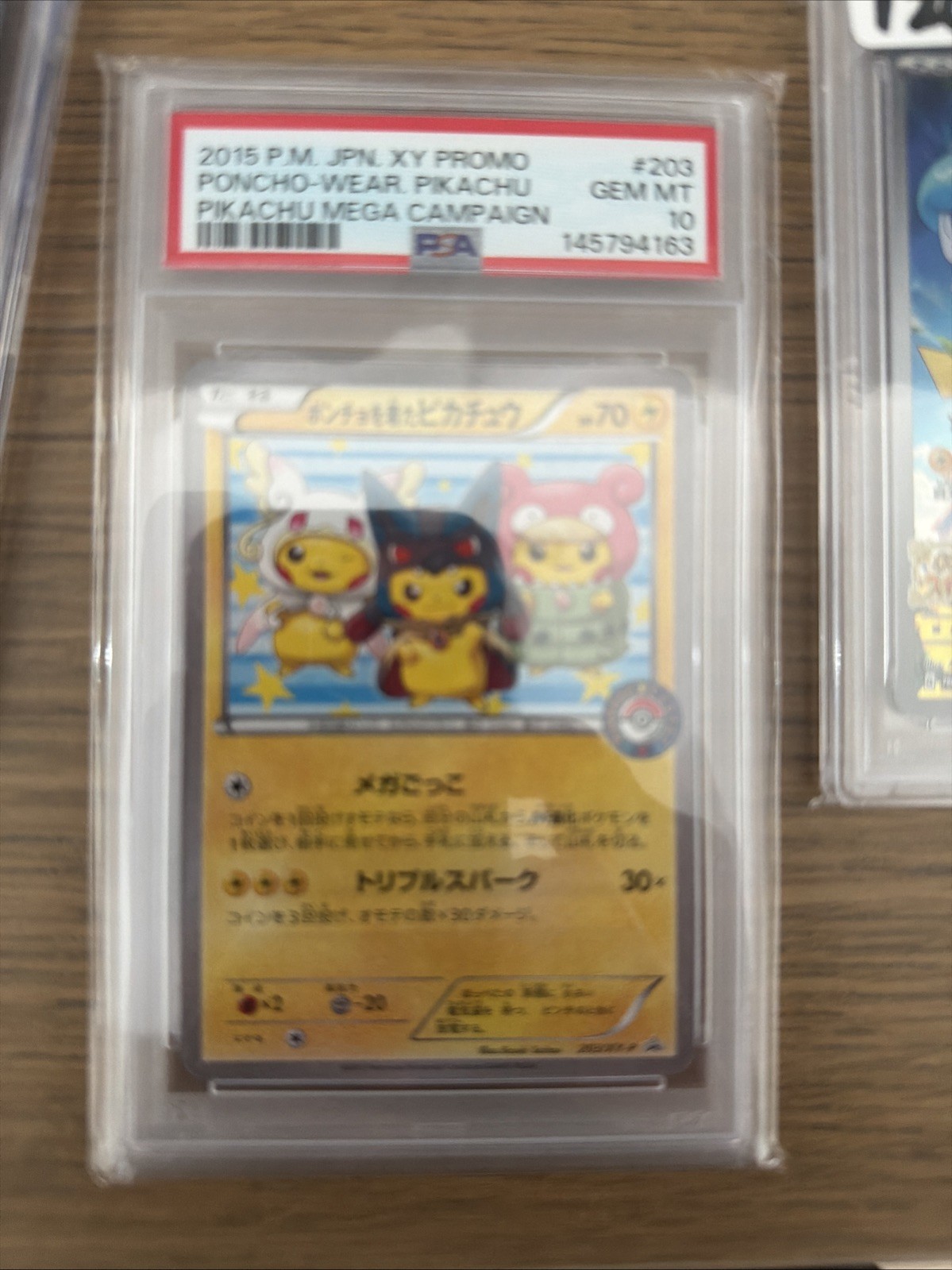 Pokemon 15 Poncho Wearing Pikachu 203/XY-P Pikachu Mega Campaign Japanese PSA 10