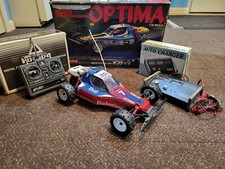 Vintage Original Kyosho Optima 4WD with tons of upgrades and extras Controller