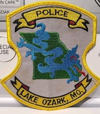LAKE OZARK MISSOURI Police Shoulder Patch DRAGON FIRE STATE SHAPE OUTLINE 9C