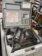 ITW PASLODE IMPULSE CORDLESS NAILER  MODEL 325 W/CHARGER NEEDS BATTERY