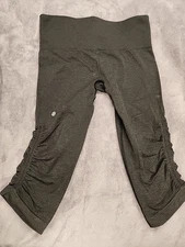 Lululemon Ebb and Flow Fatigue Black Crop Size 6