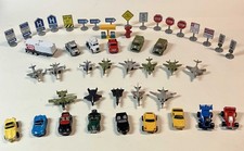 Lot - 47 Vintage Micro Machines-sports race cars , planes, trucks, road signs