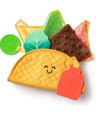 Melissa  Doug Infant Baby Textured Toy Multi-Sensory Soft Taco Fill and Spill