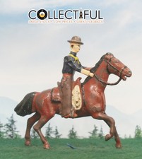 BRITAINS - PRE WAR - LEAD FIGURE - MOUNTED COWBOY WITH CHAPS RARE 1203