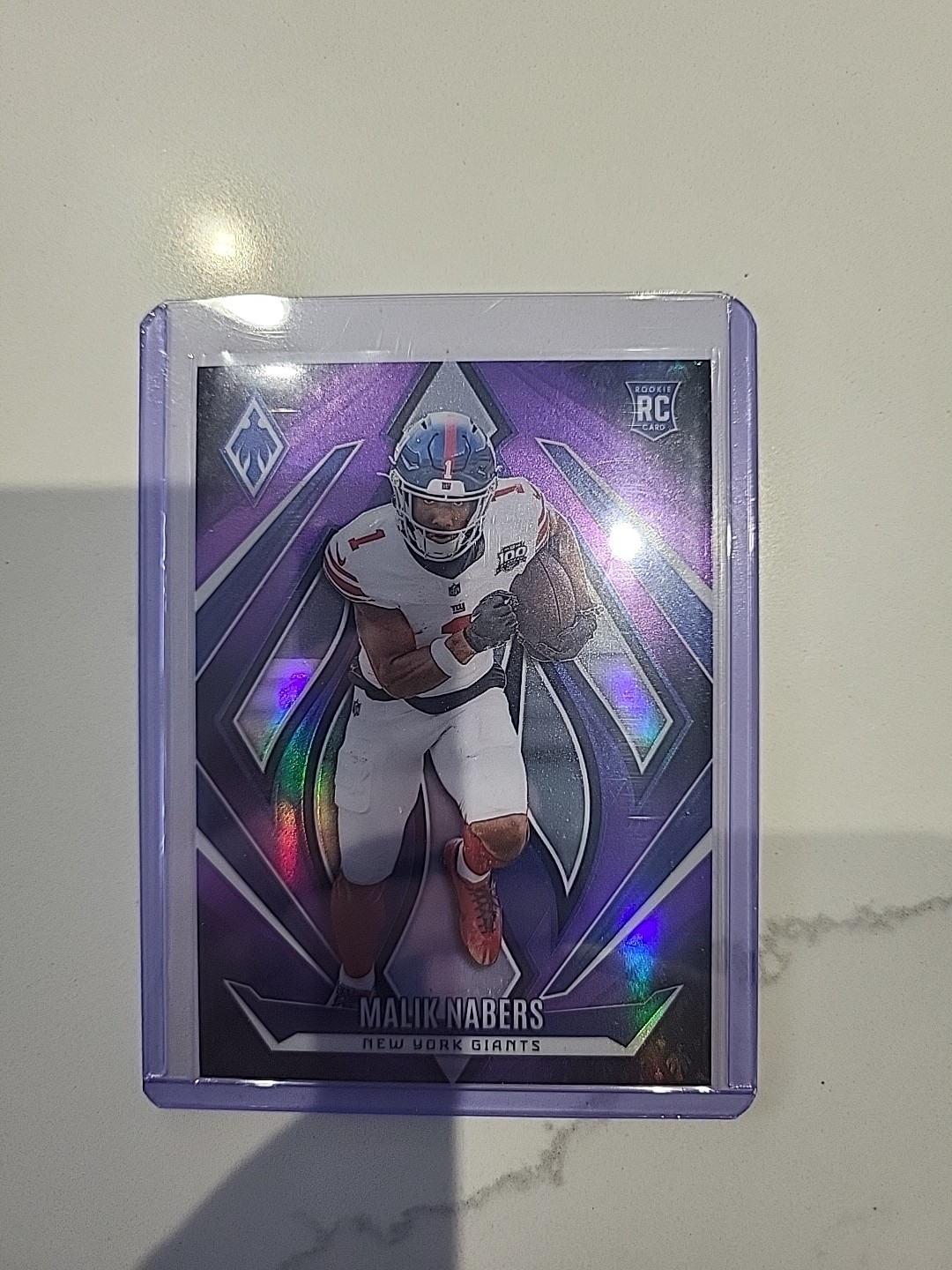 2024 Panini Phoenix - Rookies Malik Nabers #221 (RC) Purple NFL